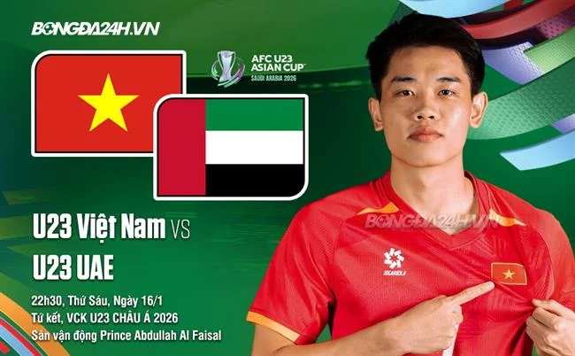 Vận động viên tennis đang giao bóng trên sân đất nện